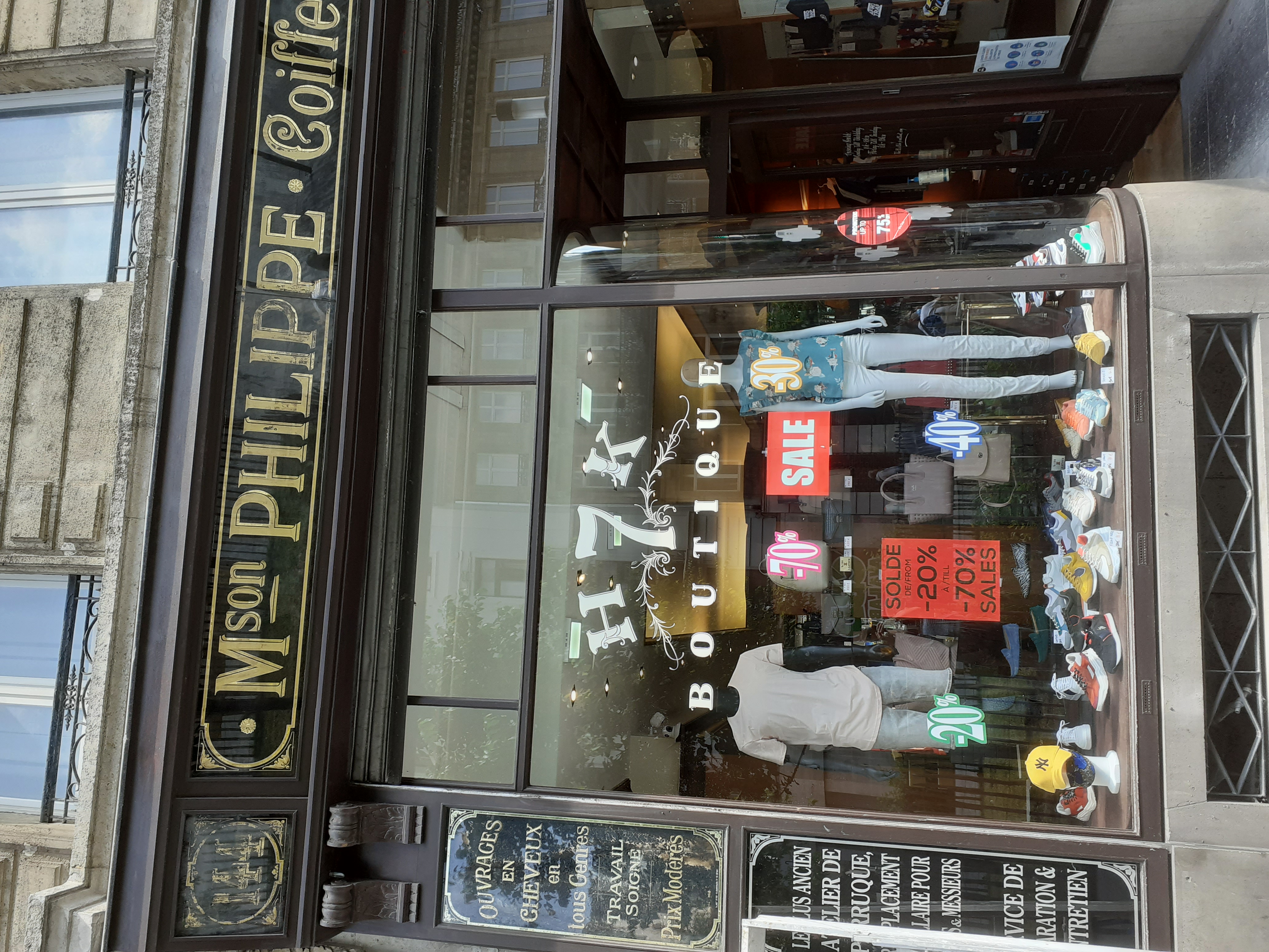 Lettrage peint sur vitrine façon vintage - H 7 K - 1000 Bruxelles