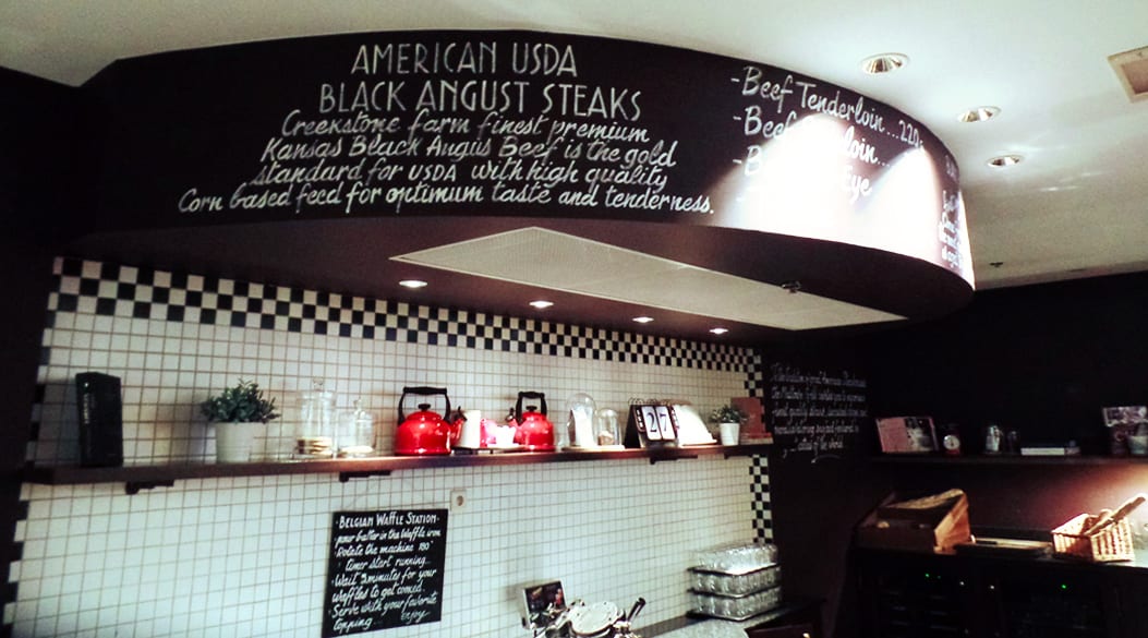 Lettrage à la craie sur panneau noir - Un cachet de proximité - Mariott Hotel (à la Bourse) - Bruxelles