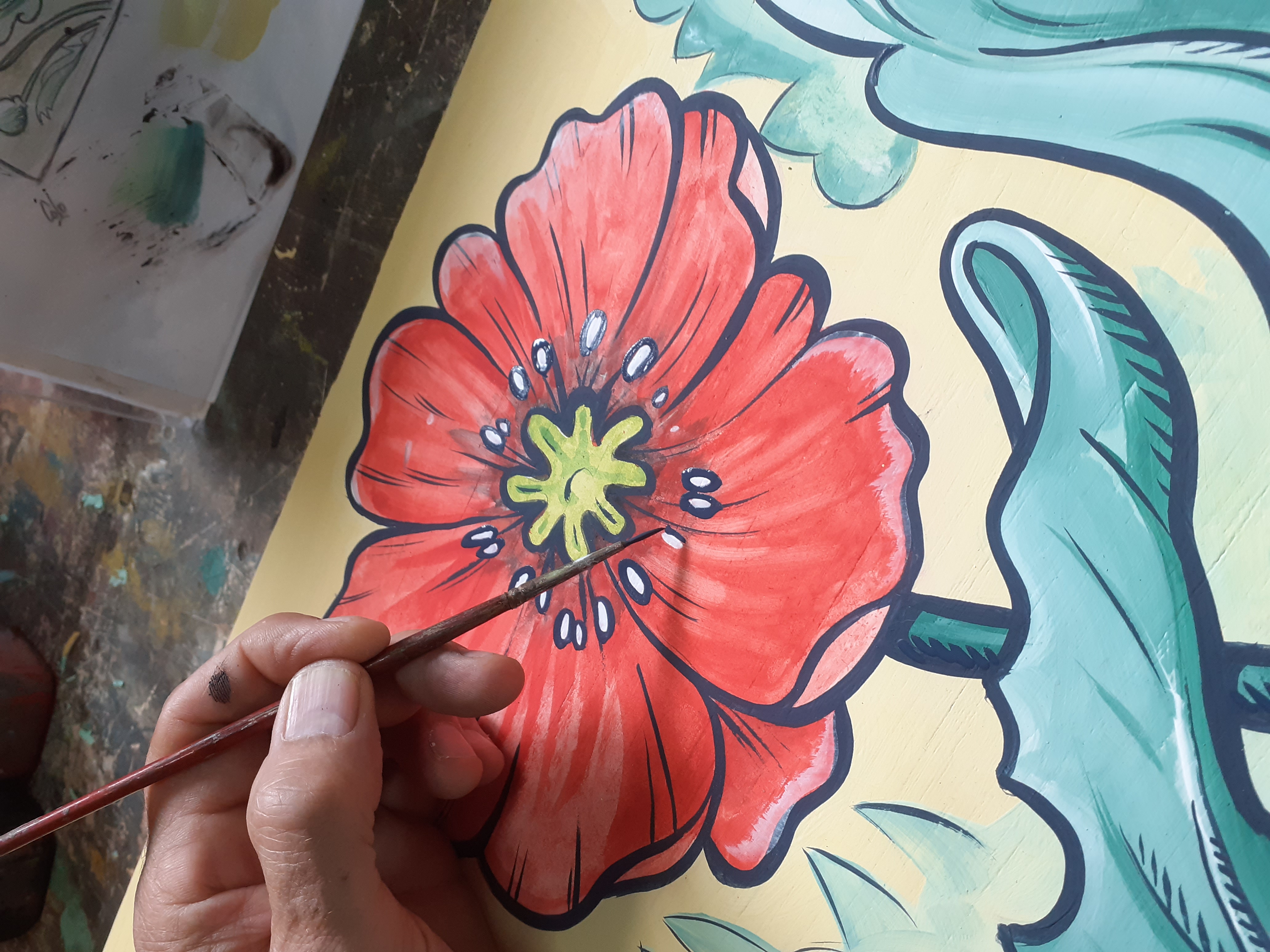 Détail de peinture sur les panneaux en chêne